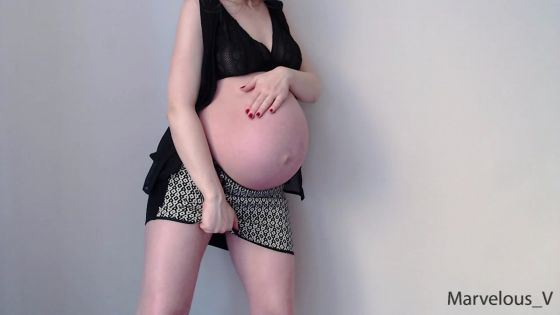 Pregnant girl dancing strip tease