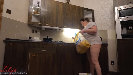 Big natural tits in the kitchen